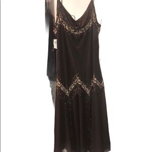 Women’s brown beaded dress.